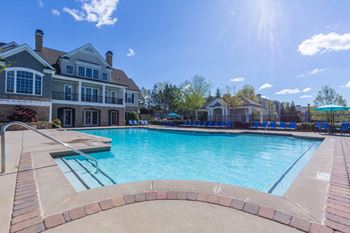 Resort style pool with sundeck poolside cabana